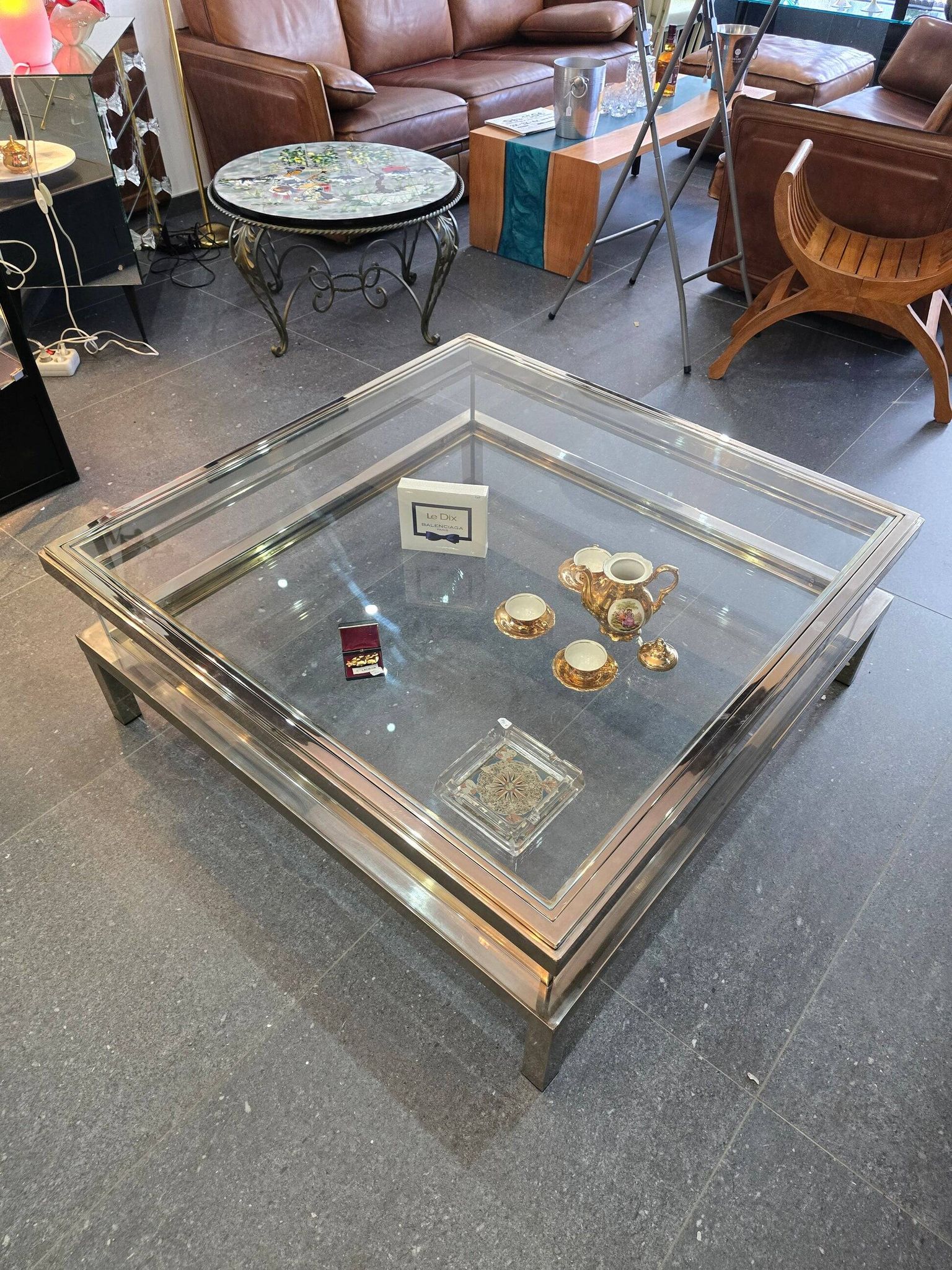 Sliding top coffee table – 70s design – chrome & glass – 108 cm