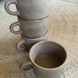 Series of 4 cups of sandstone