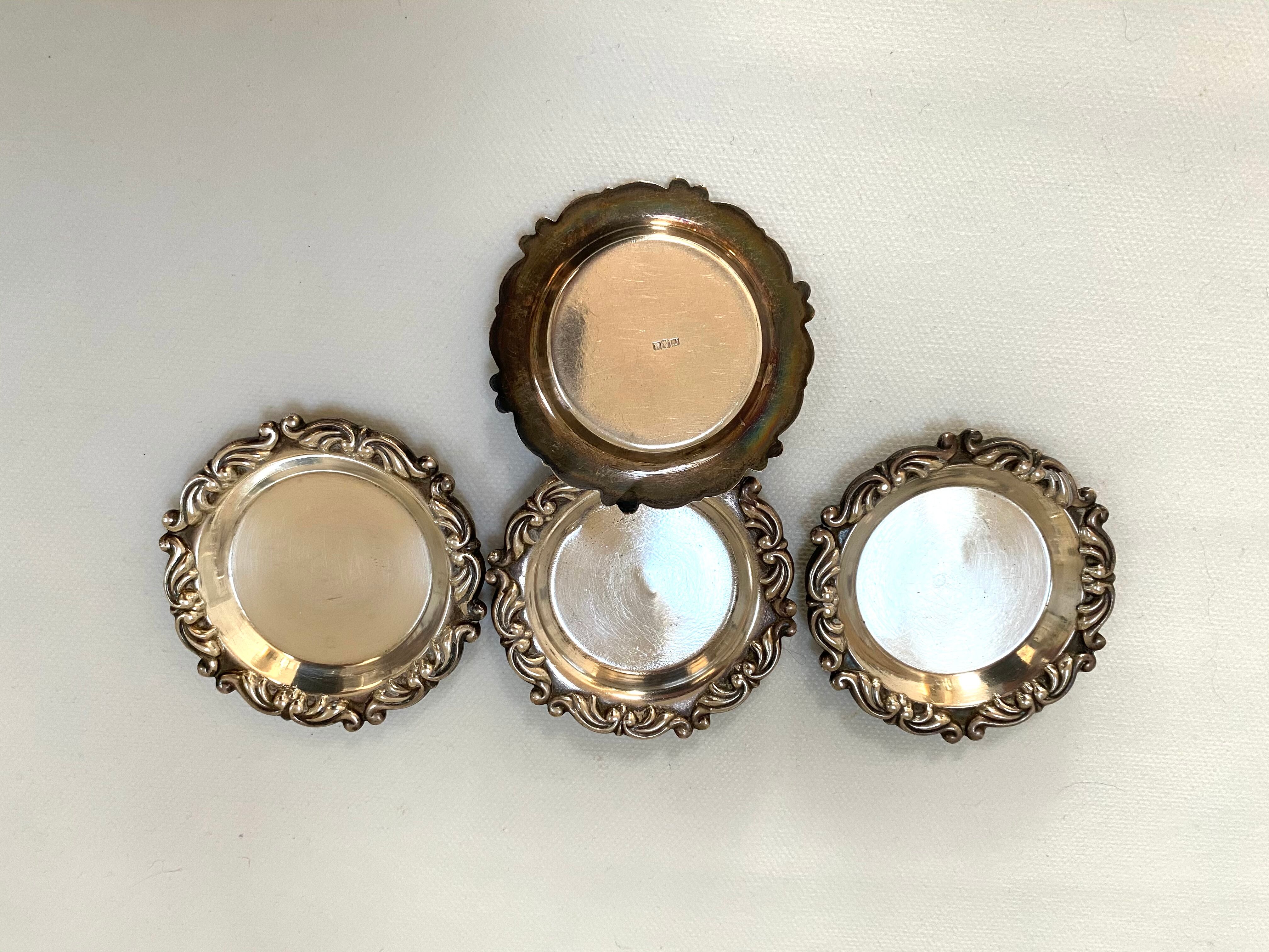 Set of 4 antique silver cups