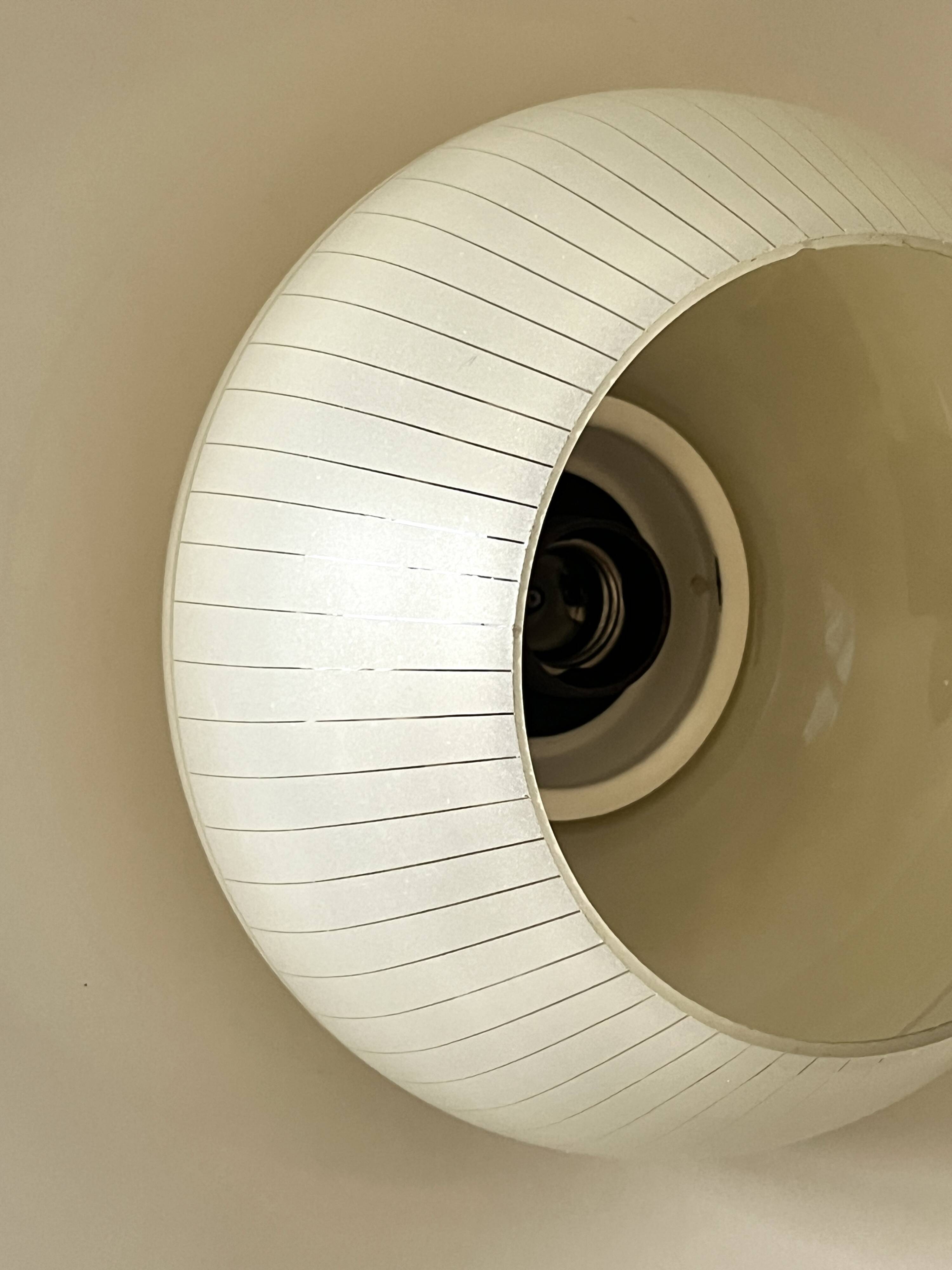 Scandinavian suspension in black metal, copper, and opal glass, 1970s design.