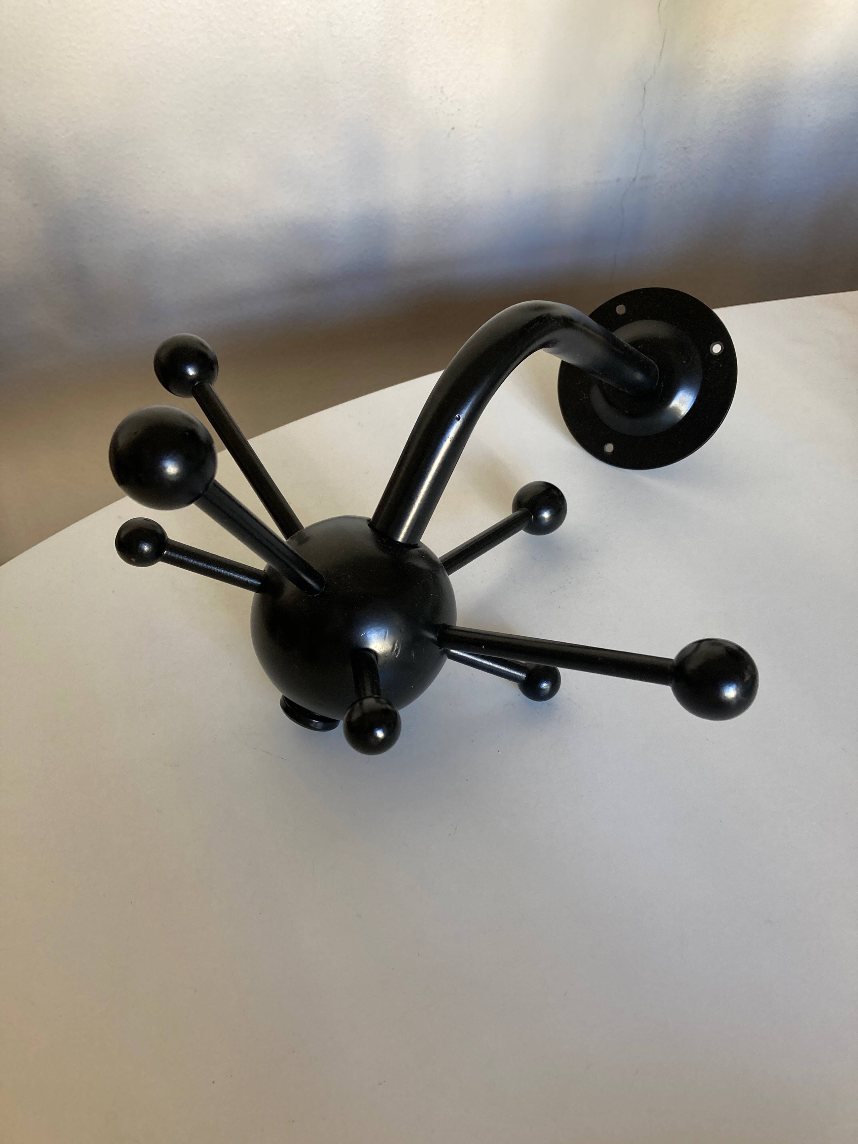Pair of black space age sputnik coat racks