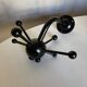 Pair of black space age sputnik coat racks