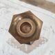 Brass candle holder high hexagonal foot