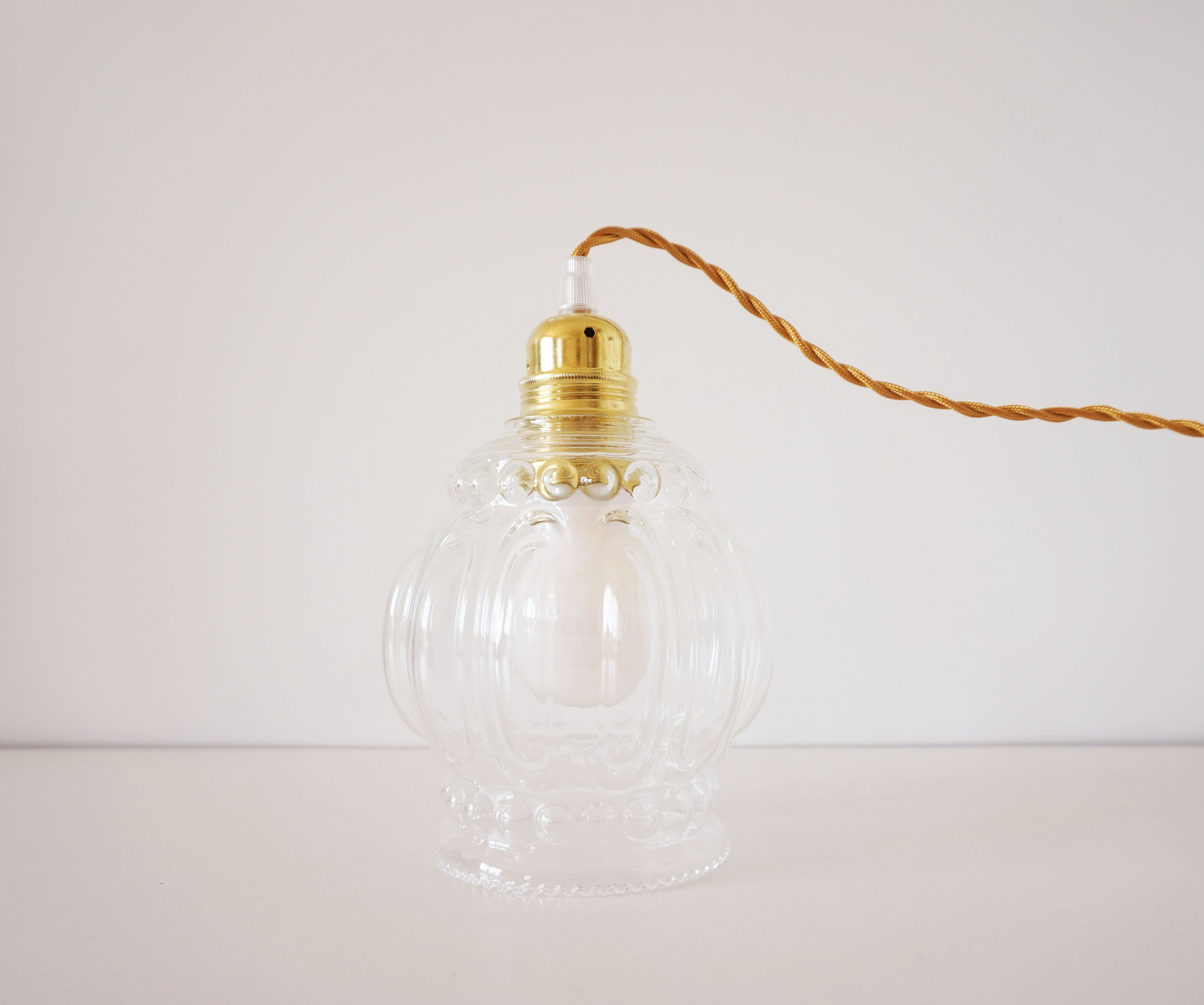 Suspension molded glass globe player