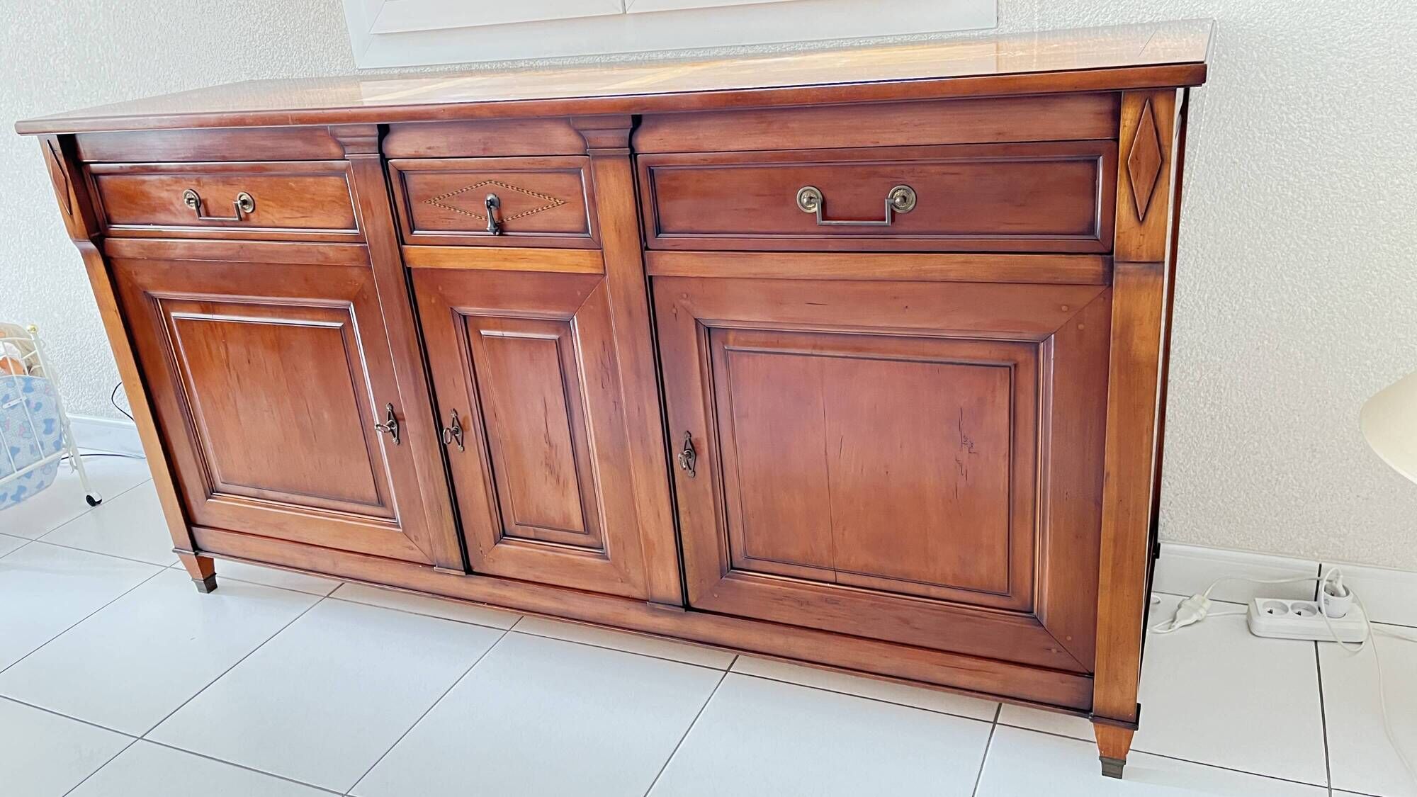 Buffet enfilade in Directoire style, made of cherry wood.