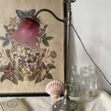 Antique jeweller's lamp, silver-plated base, frosted pink glass shade.