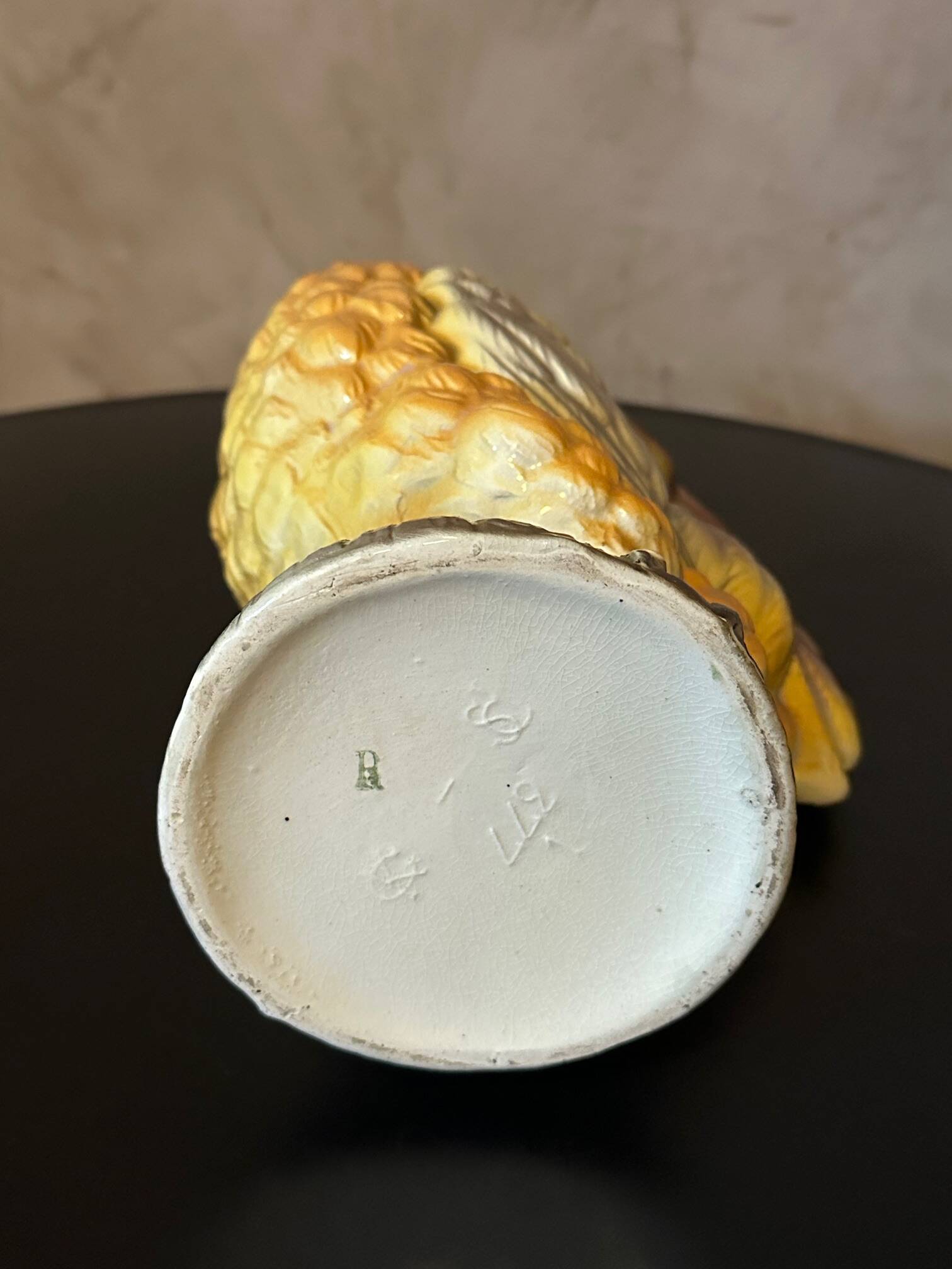 Rooster pitcher in slip