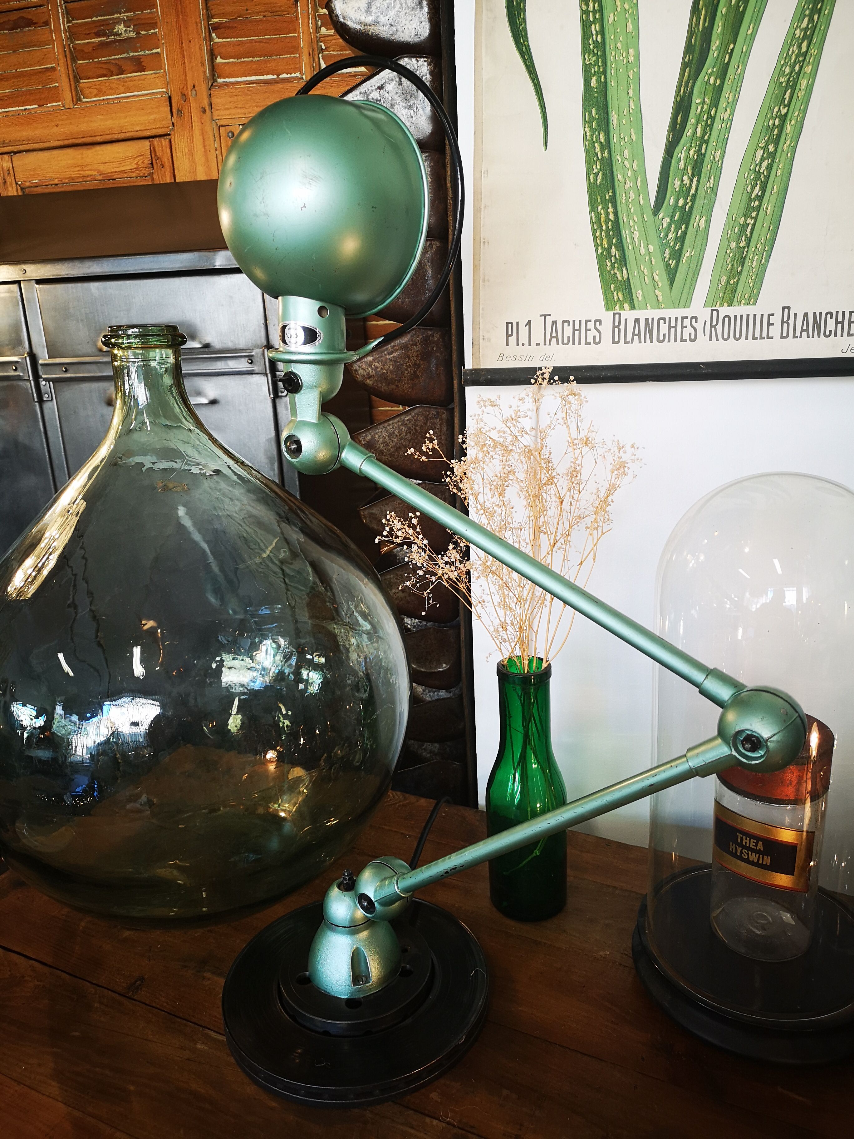 Old green metallic Jieldé lamp