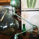 Old green metallic Jieldé lamp