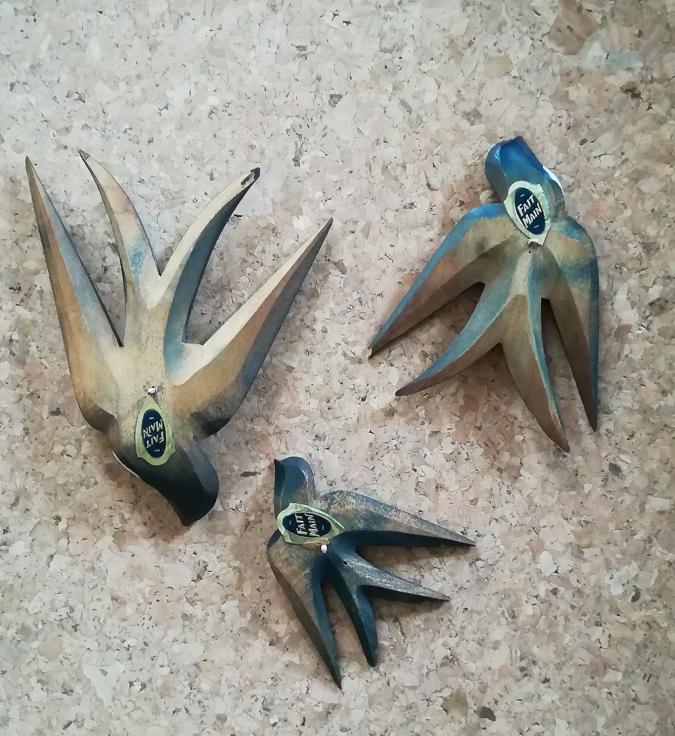 Three old wooden wall swallows