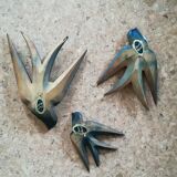 Three old wooden wall swallows