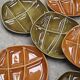 Set of 8 fondue plates Salins France in green and brown.