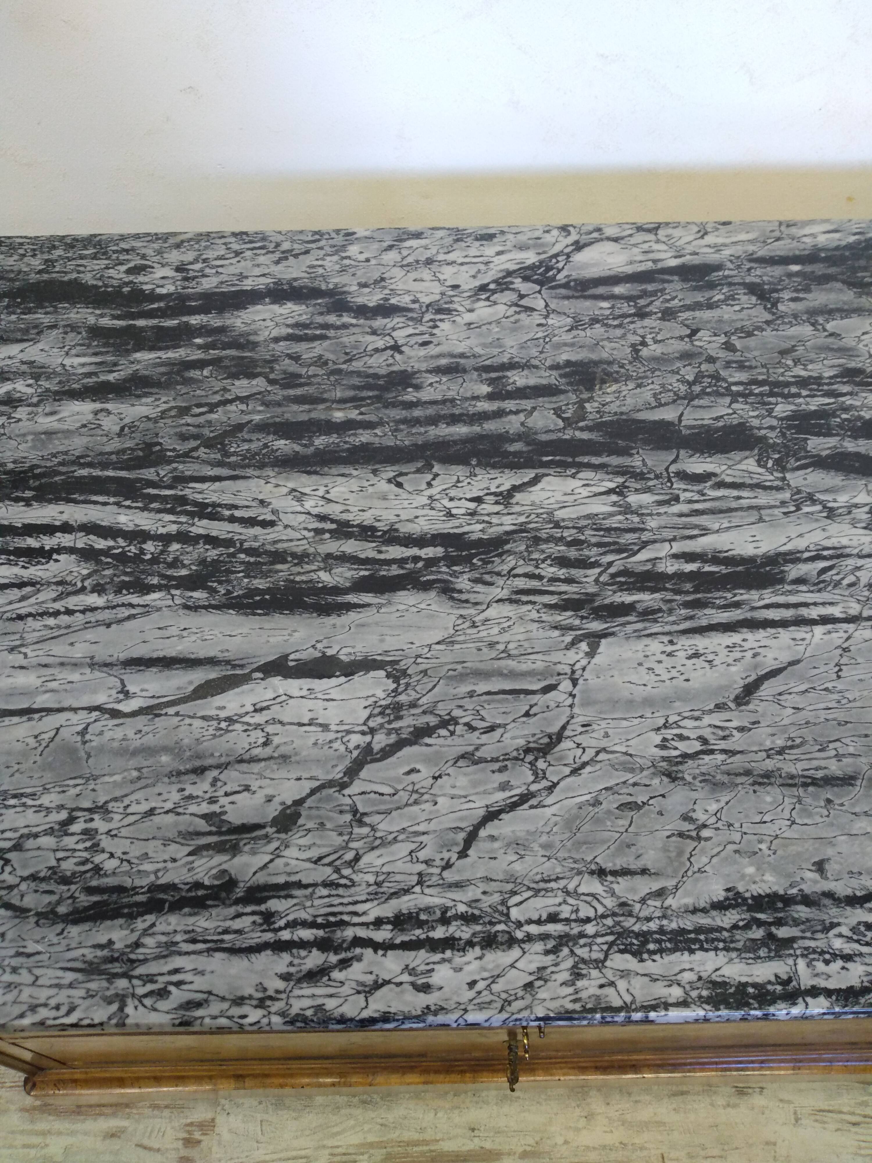 Chest of drawers with marble