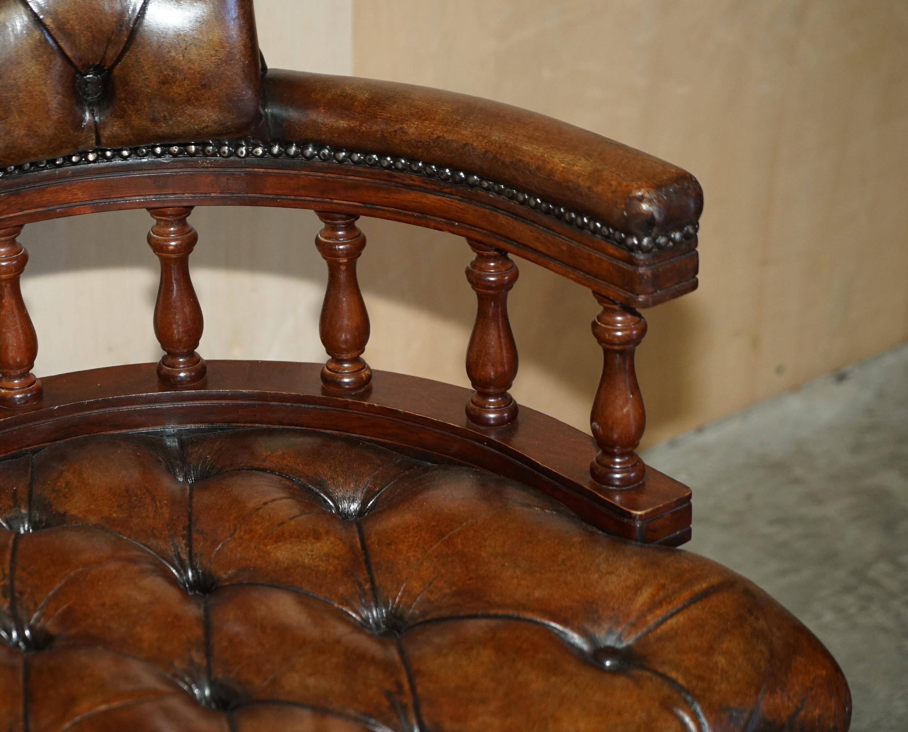 Vintage Chesterfield captain's chair in leather