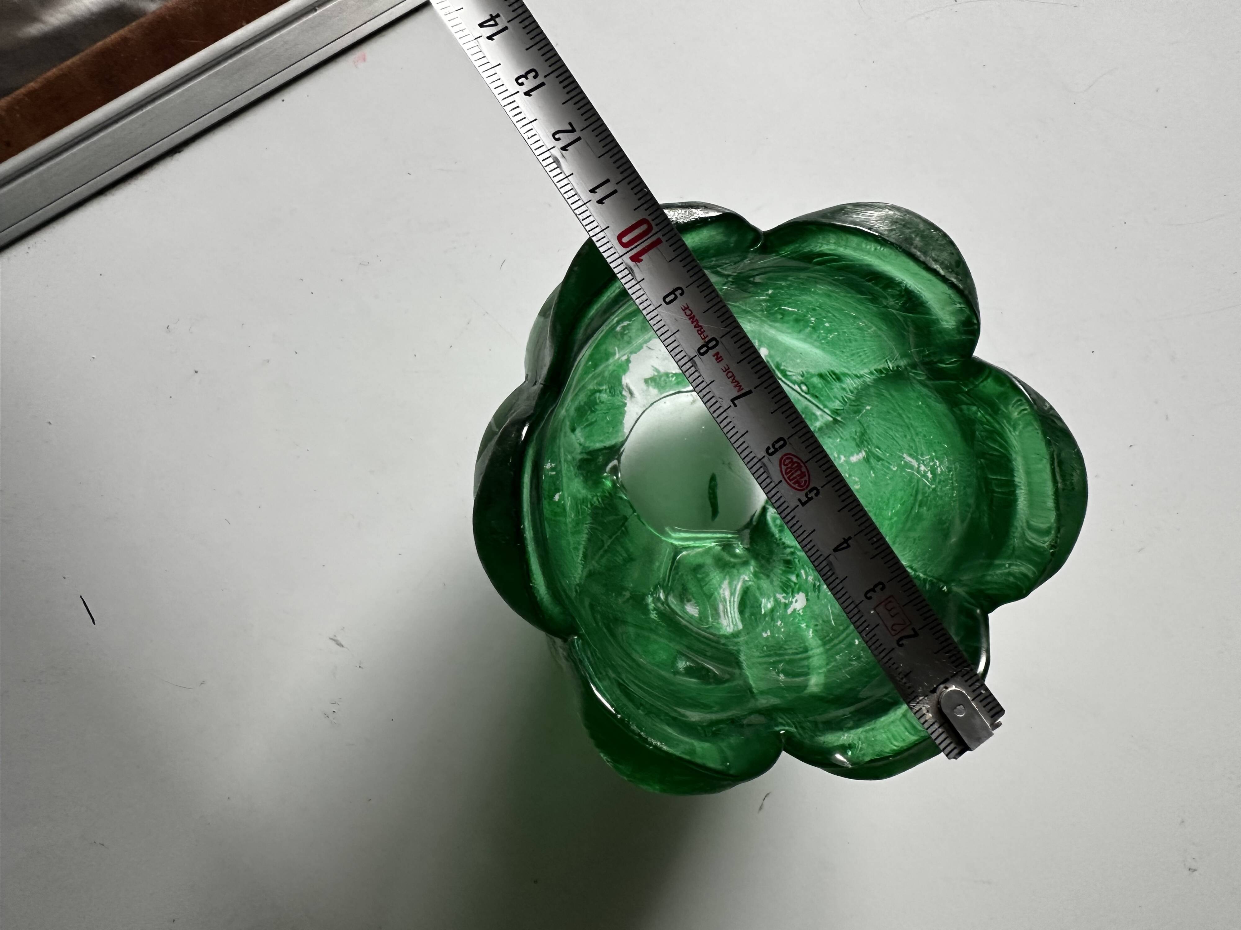 Green glass paste emptying cup from the Art Deco period