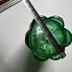 Green glass paste emptying cup from the Art Deco period