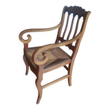antique cherry and straw armchair with cathedral back