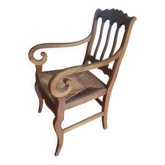 antique cherry and straw armchair with cathedral back