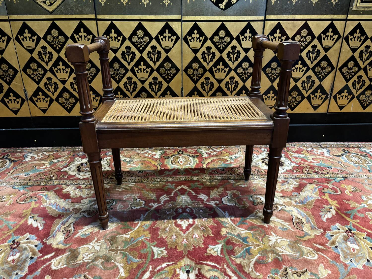 Small Louis XVI style cane bench