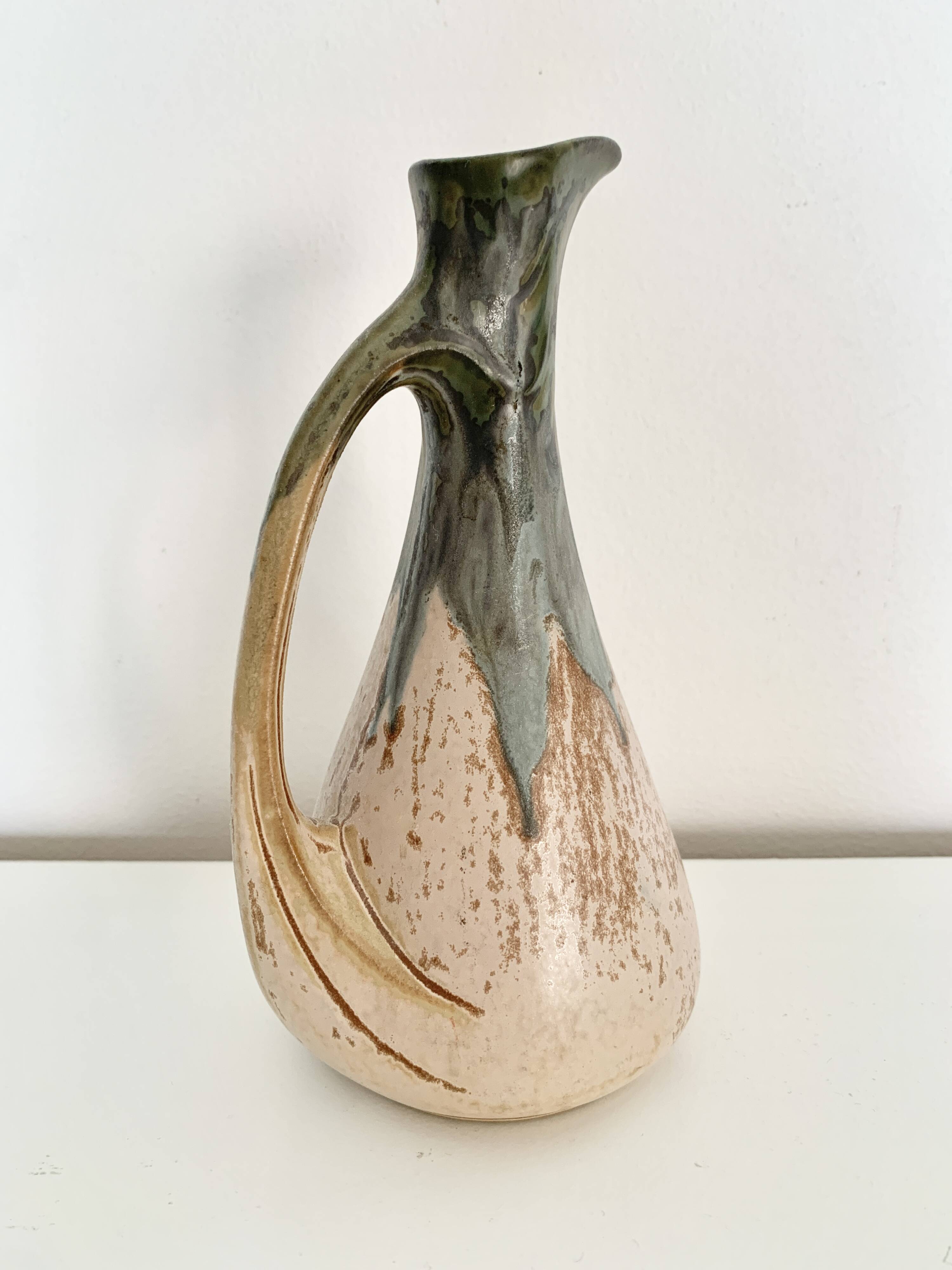Stoneware jug signed Denbac