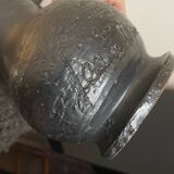 Black ceramic pitcher by Jean Marais