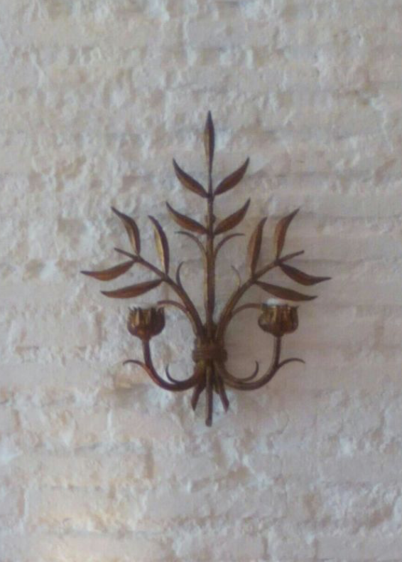 Floral applique in 1950s gold metal