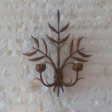 Floral applique in 1950s gold metal