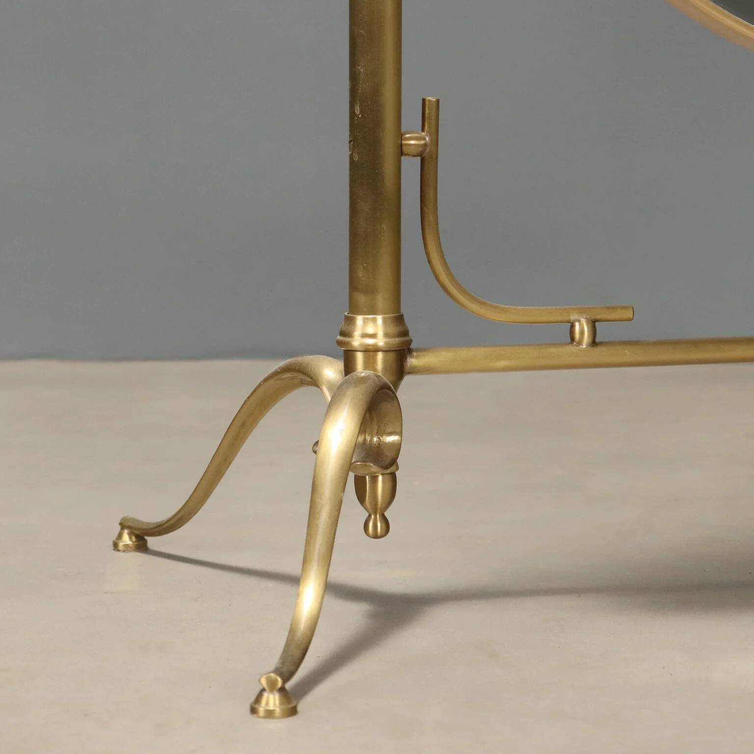 Brass vanity mirror with adjustable tilt