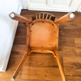 Baumann chair stamped in red skai