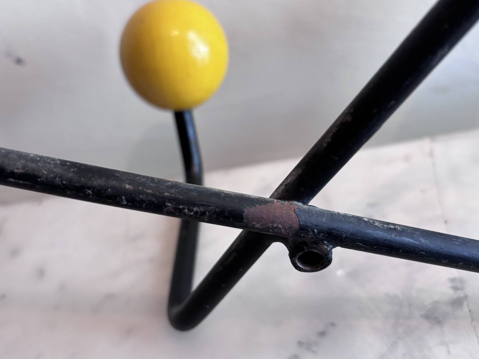Wall coat rack Roger Feraud, metal and wooden balls.