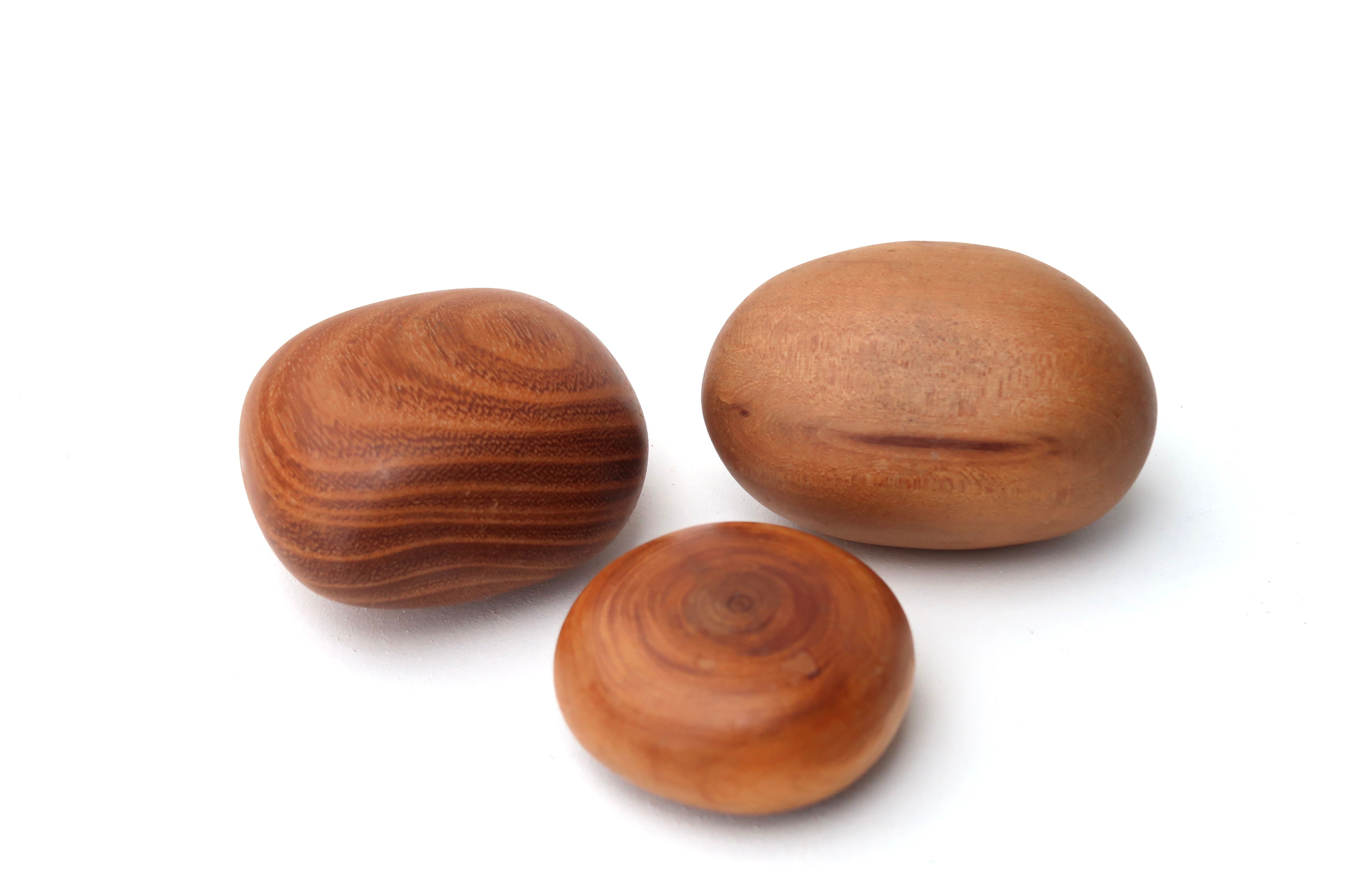 Wooden "pebble" paperweight, 70s