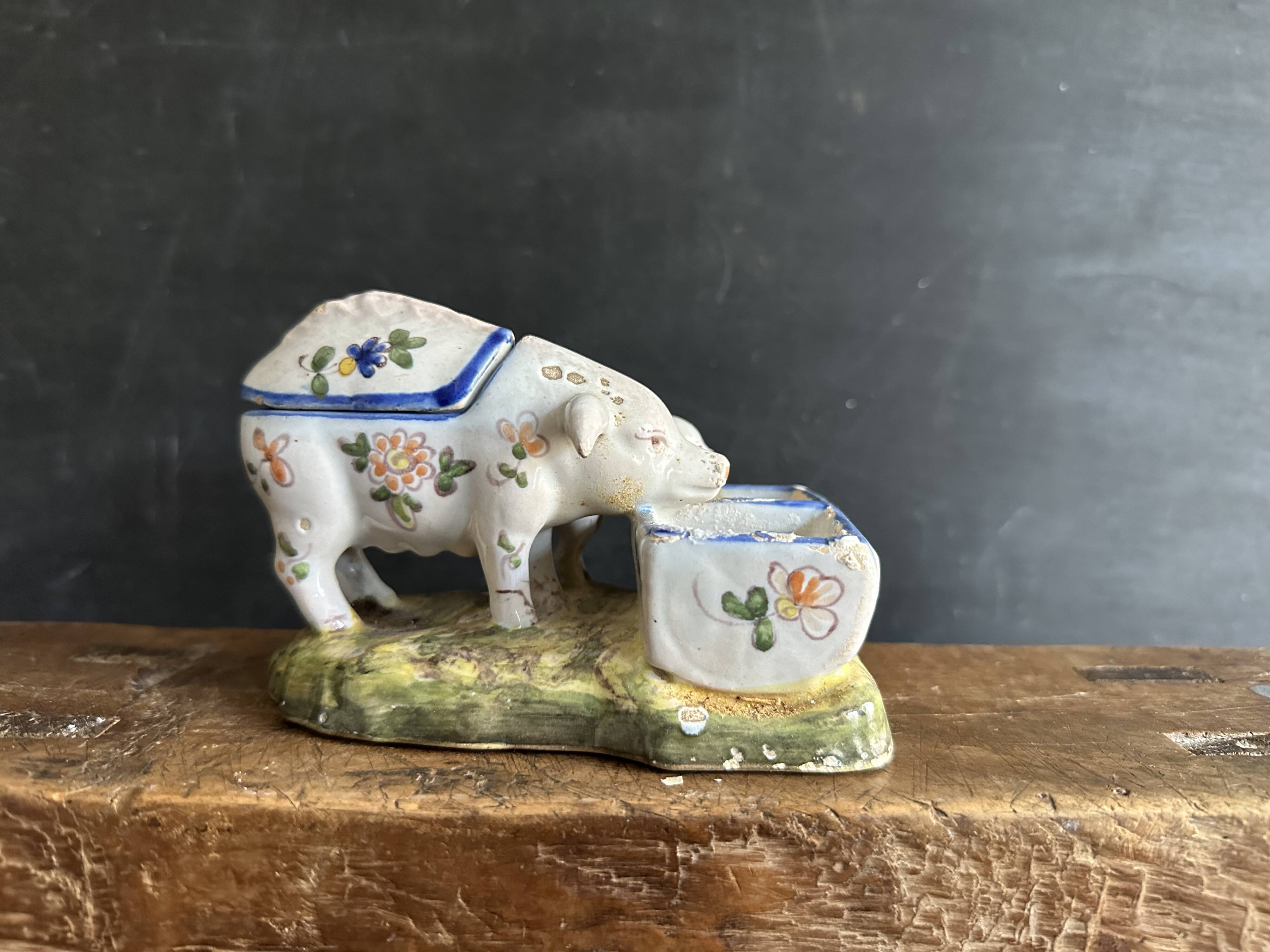 Antique earthenware pig box, salt cellar or mustard pot, floral decoration.