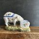 Antique earthenware pig box, salt cellar or mustard pot, floral decoration.