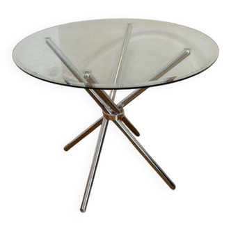 Round glass dining table with a diameter of 90 cm – Chrome central base.