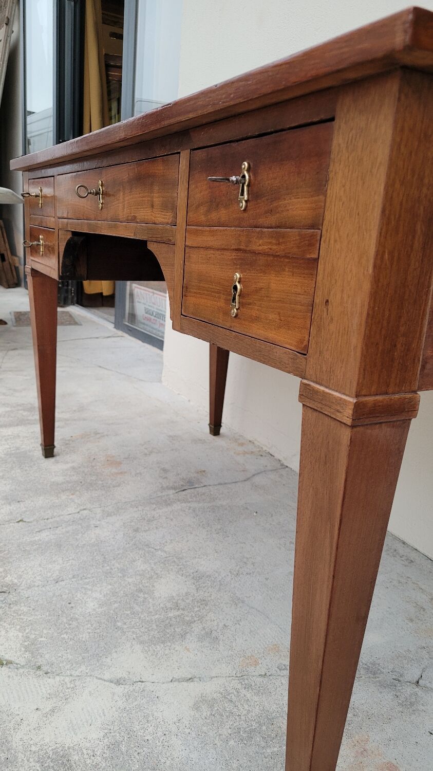 Louis XVI style flat desk in 19th century mahogany