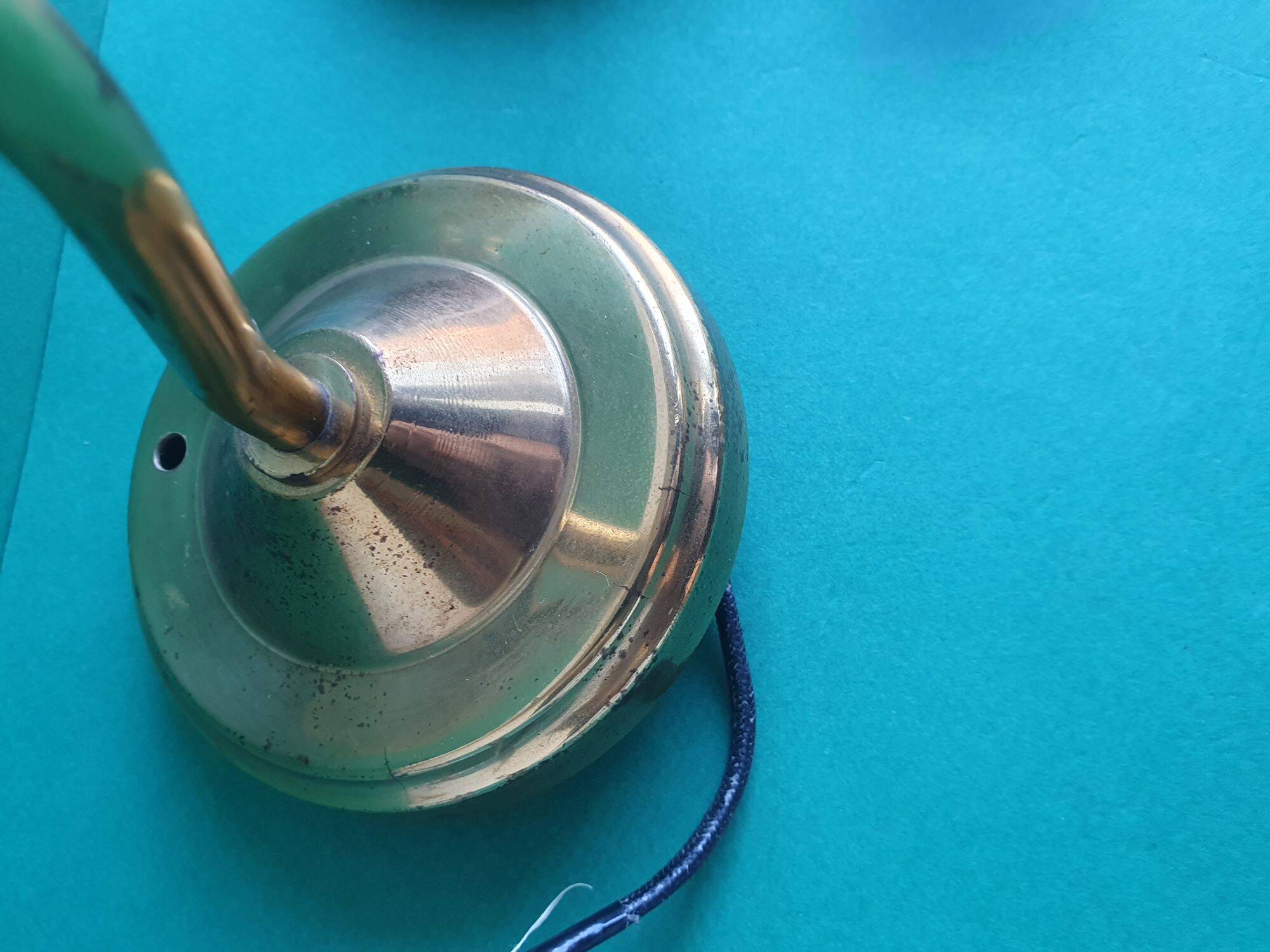 Pair of antique gold candlestick wall sconces