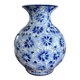 Blue and white ceramic vase with floral pattern in the shape of a vintage ball
