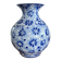 Blue and white ceramic vase with floral pattern in the shape of a vintage ball