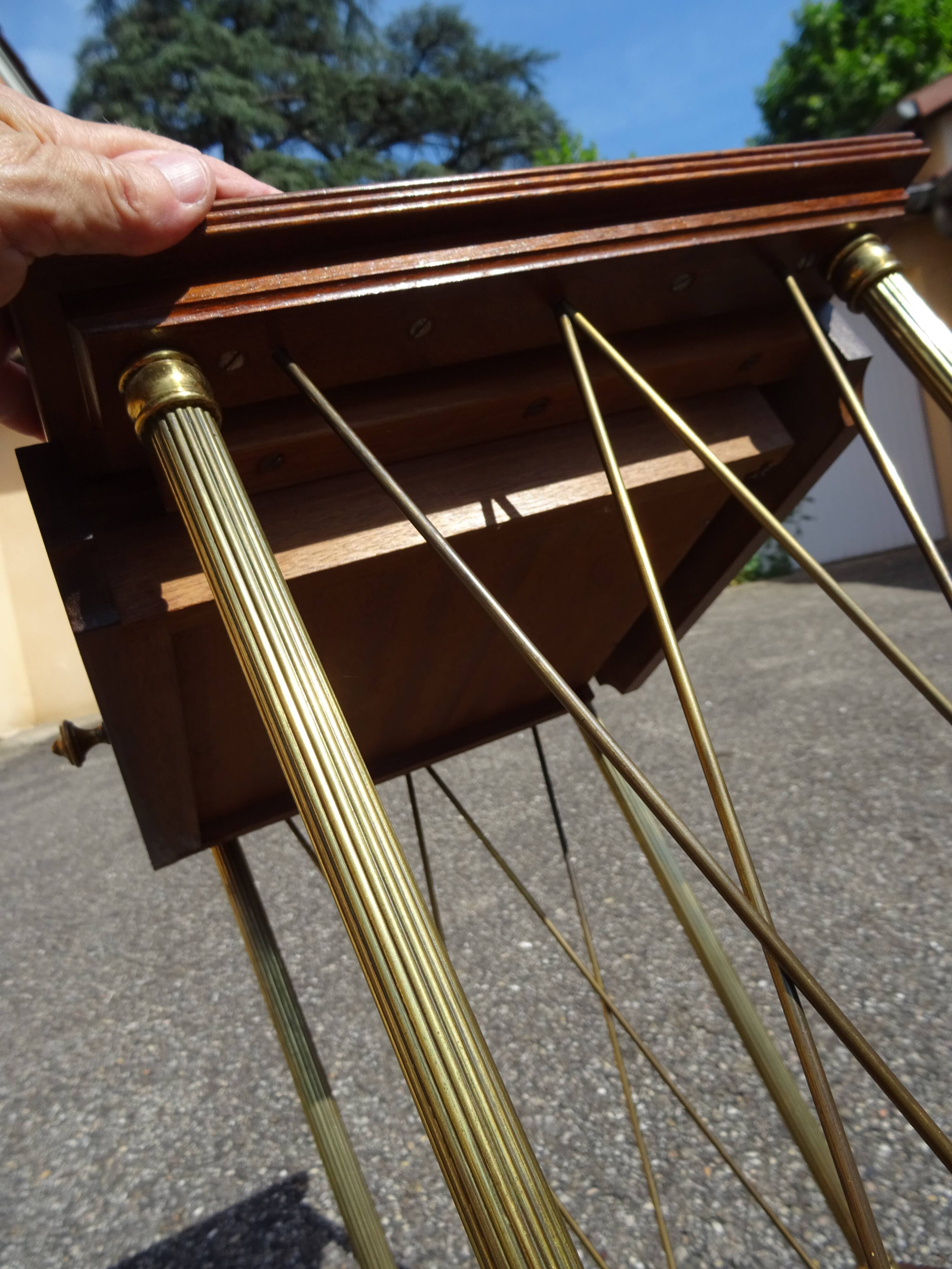 Neo-classical side table in wood and brass from the 1970s.