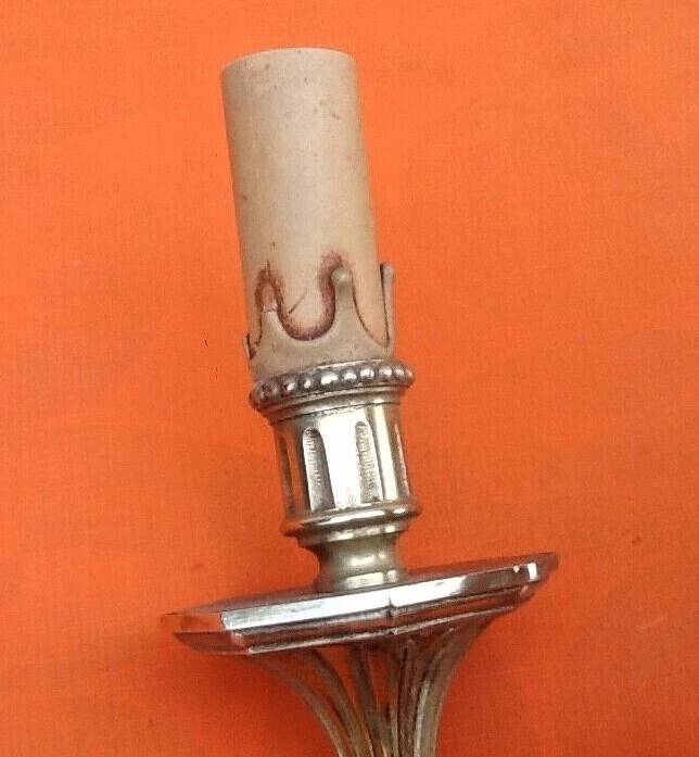 Large wall sconce in LXV style, patinated bronze.