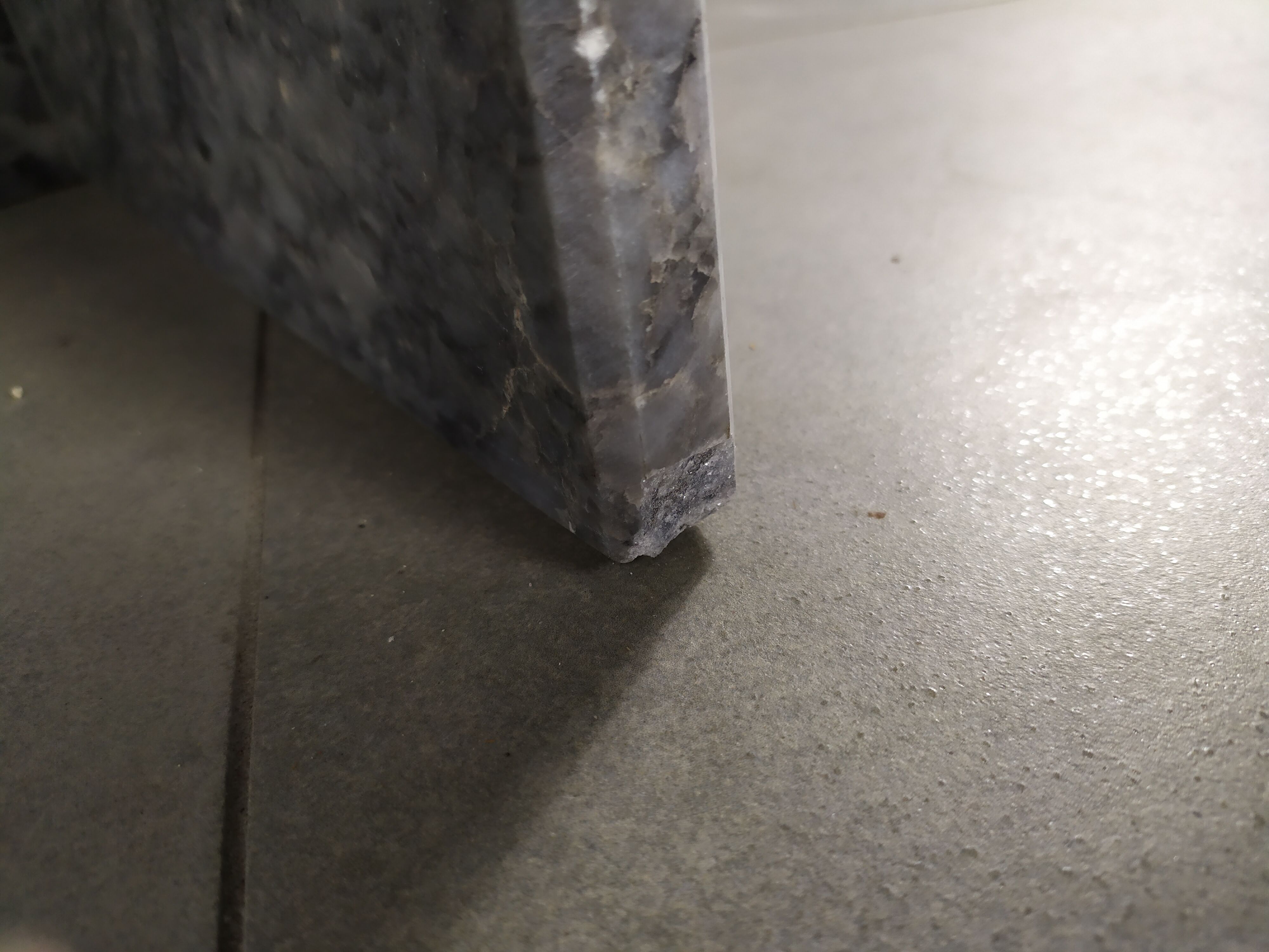 Grey marble coffee table tastes water