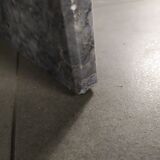 Grey marble coffee table tastes water