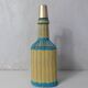 Bouteille en scoubidou vintage