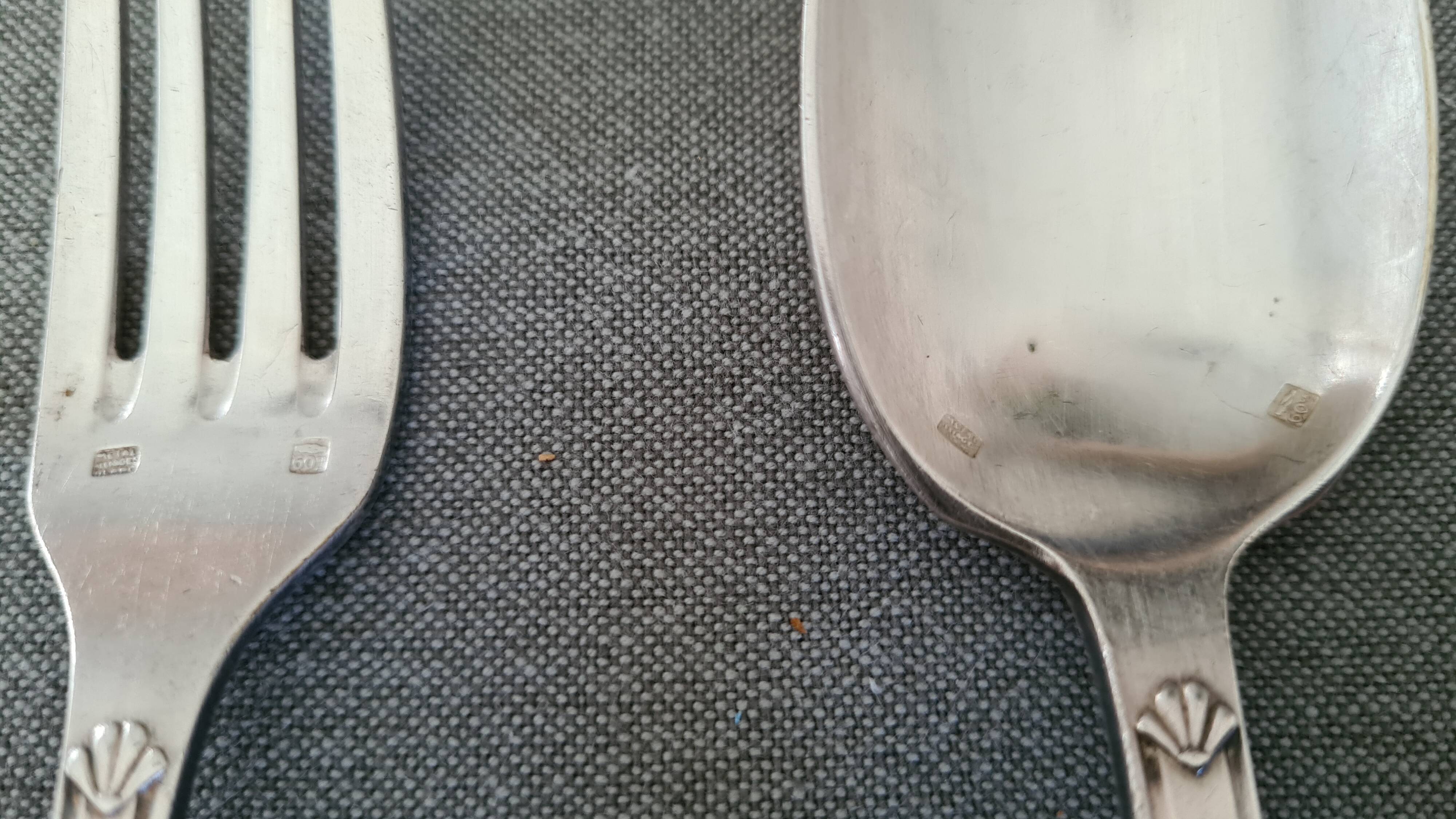 Silver metal cutlery