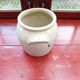 Off-white sandstone pot