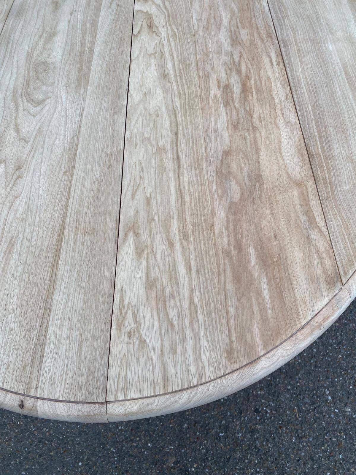 Renovated Louis Philippe round extendable dining table with flaps and 3 extensions.