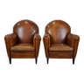 Suite de deux fauteuils de style Art Déco en cuir de mouton