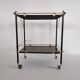 Side table with wheels in gilded metal and laminated veneer from the 70s