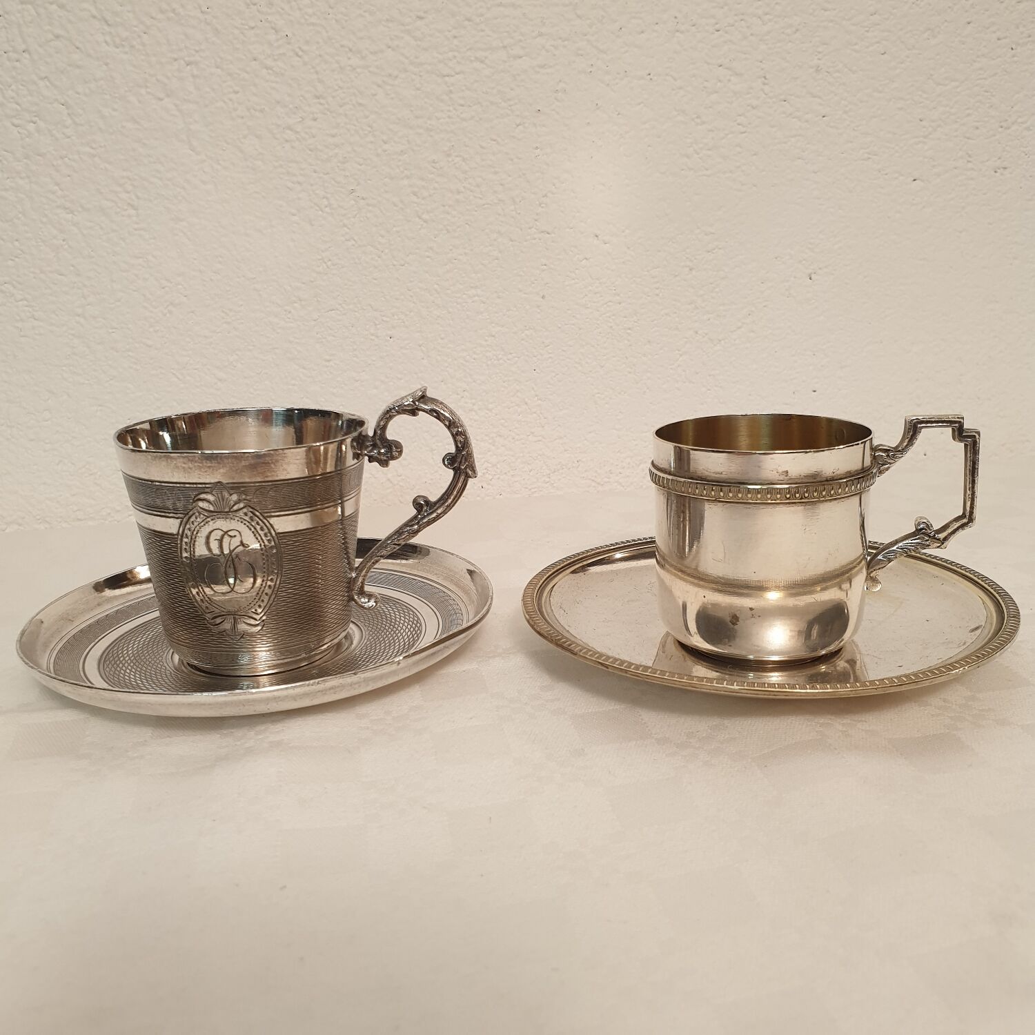 2 silver metal cups