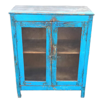 Old blue wooden showcase